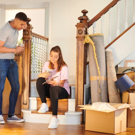 Home Inspectors Huntsville Alabama a couple on stairs inspecting renovation